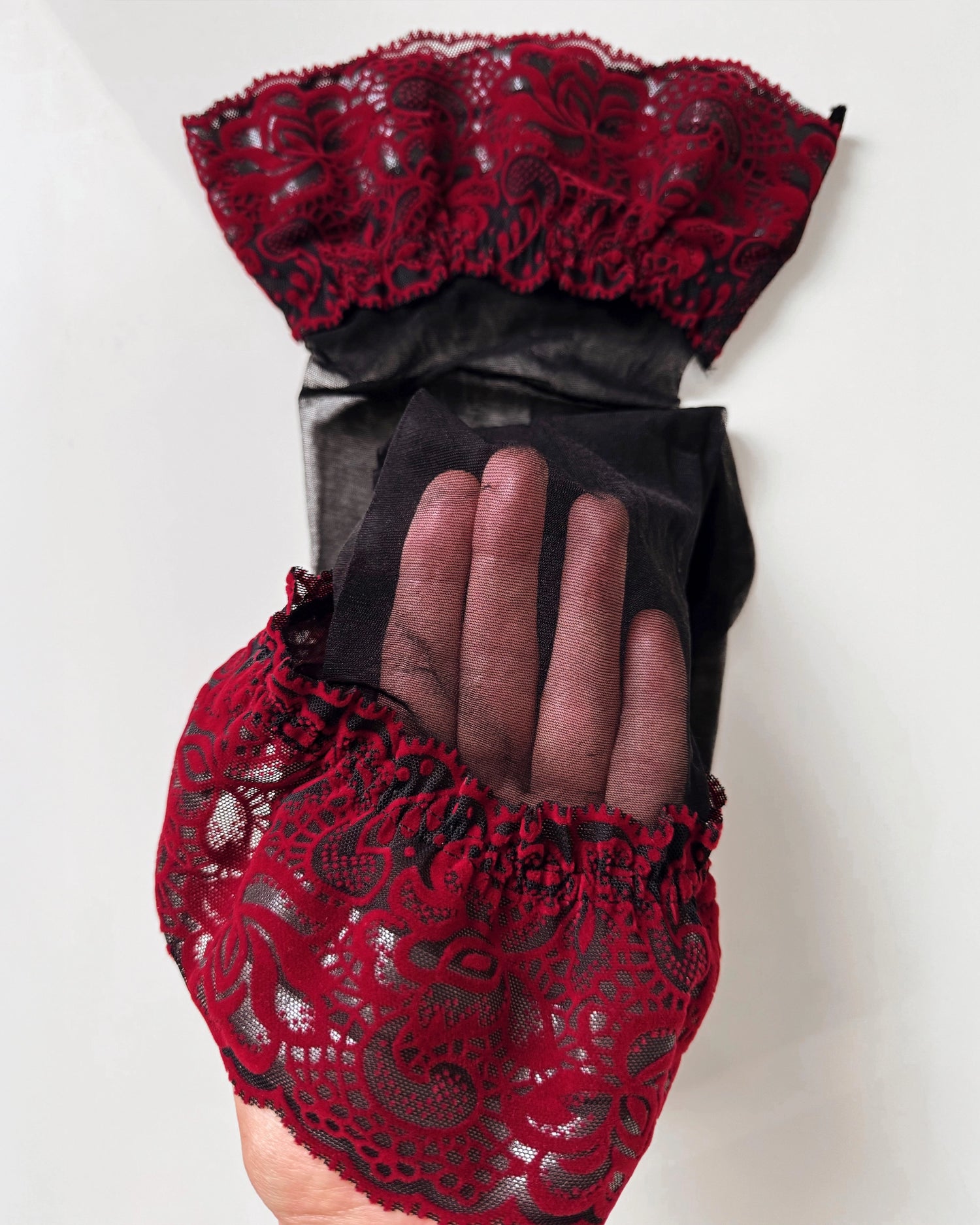 black thigh high stockings, red lace top stockings. Sheer thigh high stockings.