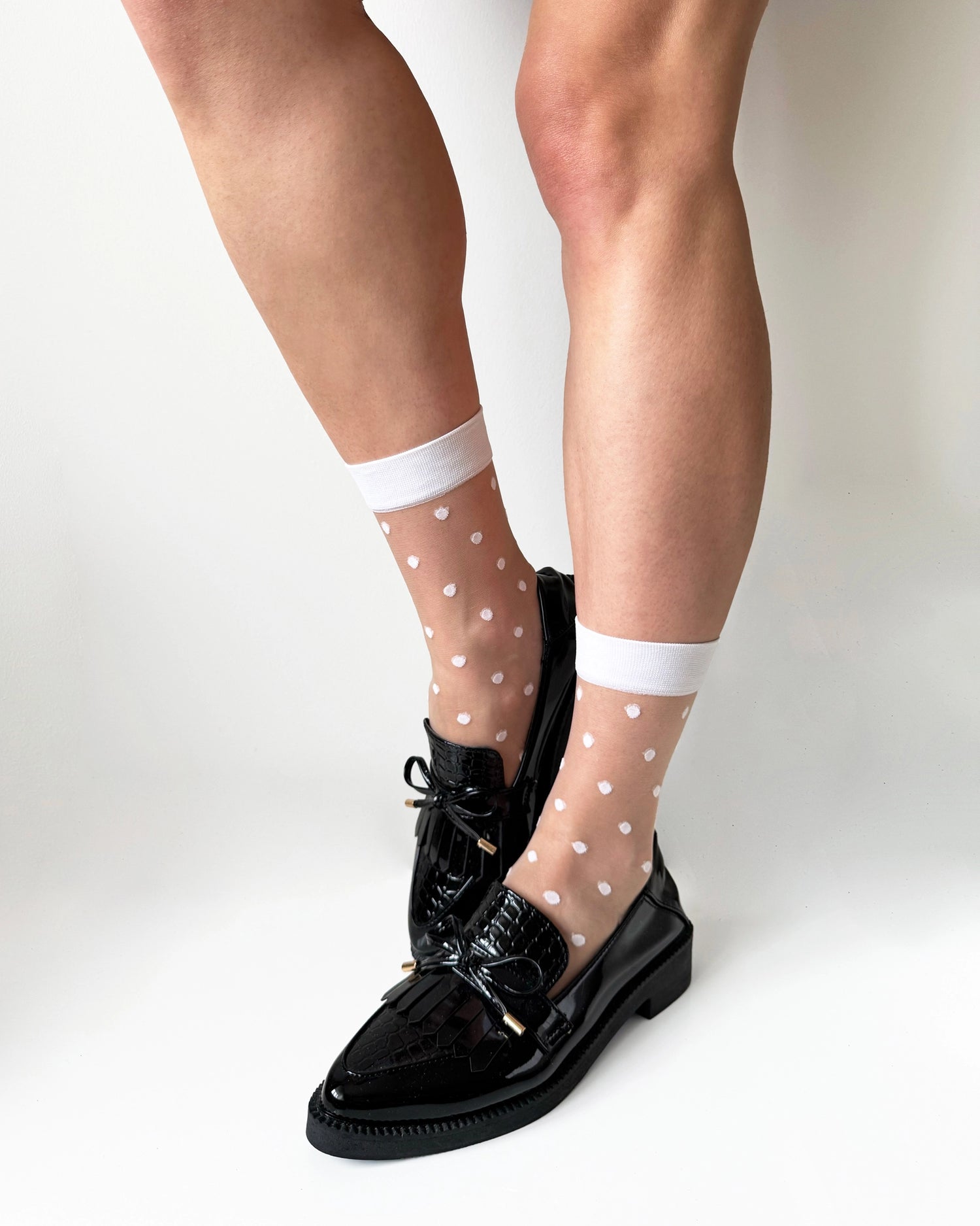 White polka dot sheer socks with loafers. Fashion socks, white crew socks for women