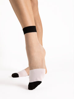 Sheer women's socks, fashion socks with a chic black and white color block pattern
