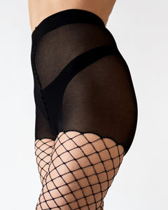 Close-up of a pair of large-mesh black fishnet tights with a soft, opaque brief. The net features silver Lurex thread woven through the net, giving it a subtle shimmer while still staying understated.