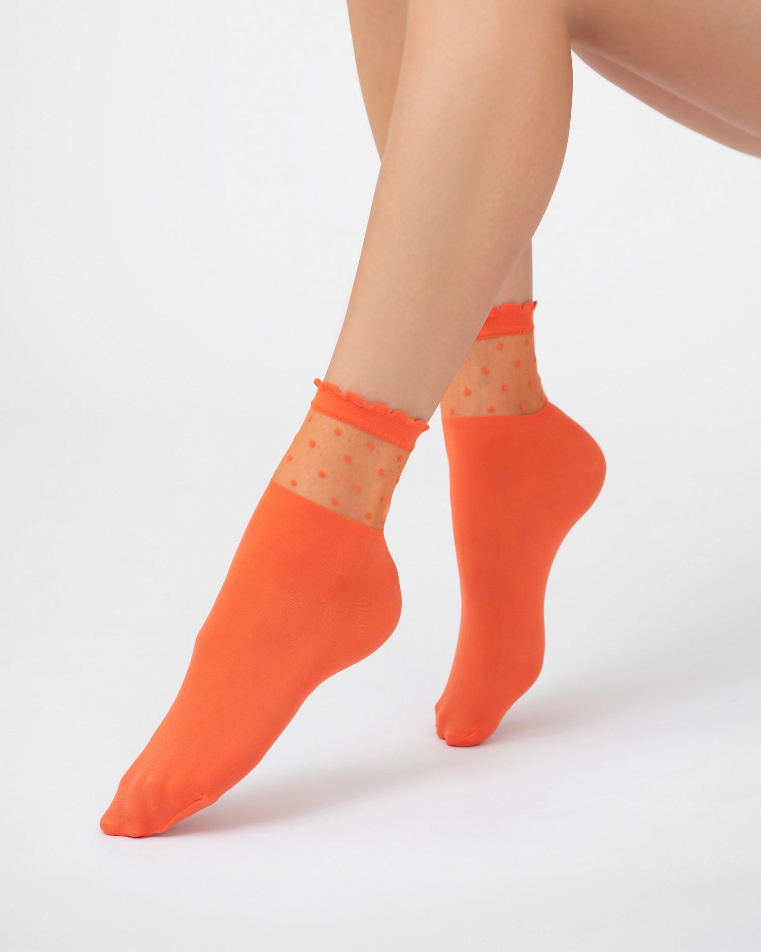 Ohdita orange ruffle socks with polka dot sheer cuff. Ultra soft nylon fashion socks for elevated casual, chic and classy outfits. Lightweight ankle socks for summer, fall, winter and spring. 