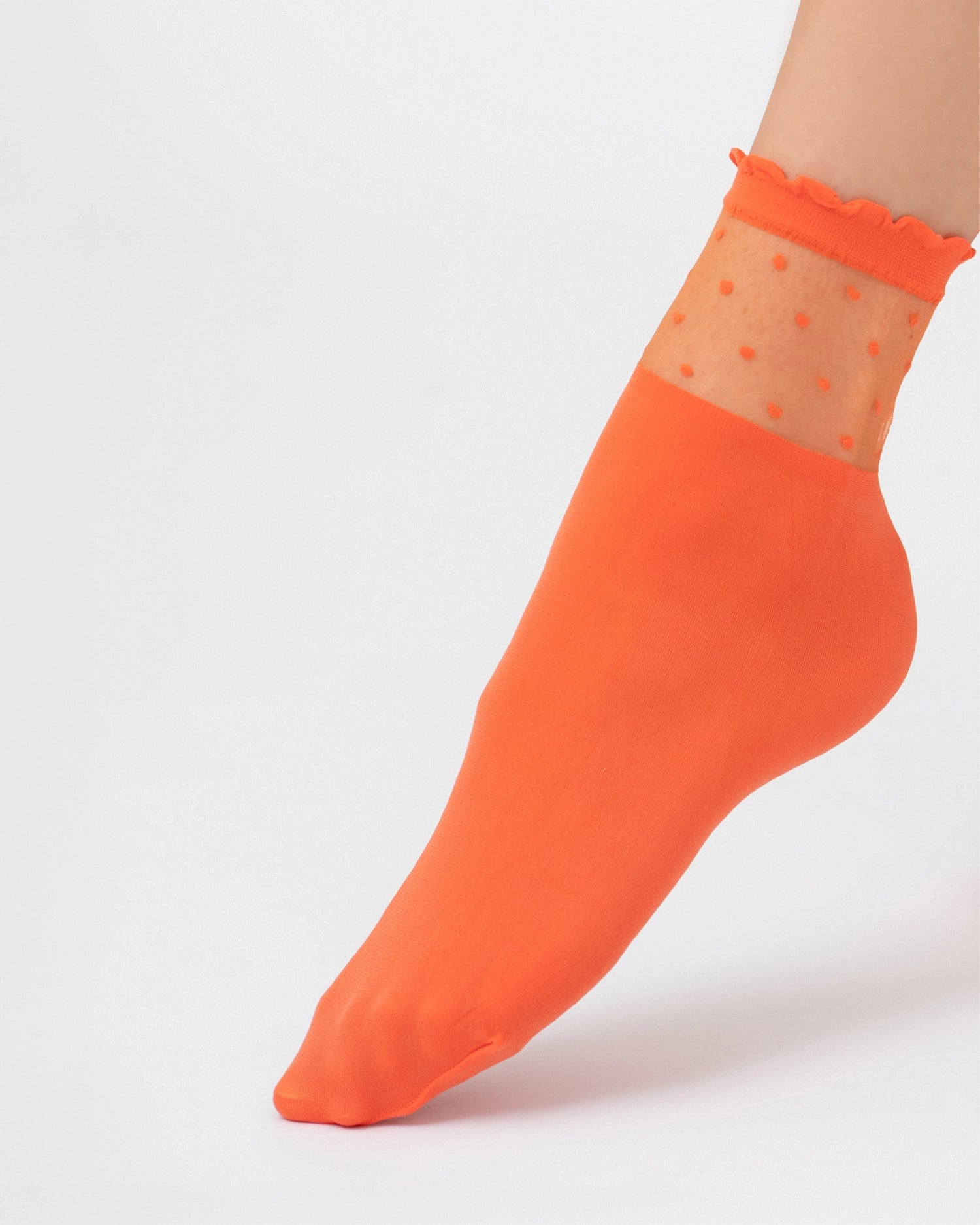 Ohdita orange ruffle socks with polka dot sheer cuff. Ultra soft nylon fashion socks for elevated casual, chic and classy outfits. Lightweight ankle socks for summer, fall, winter and spring. 